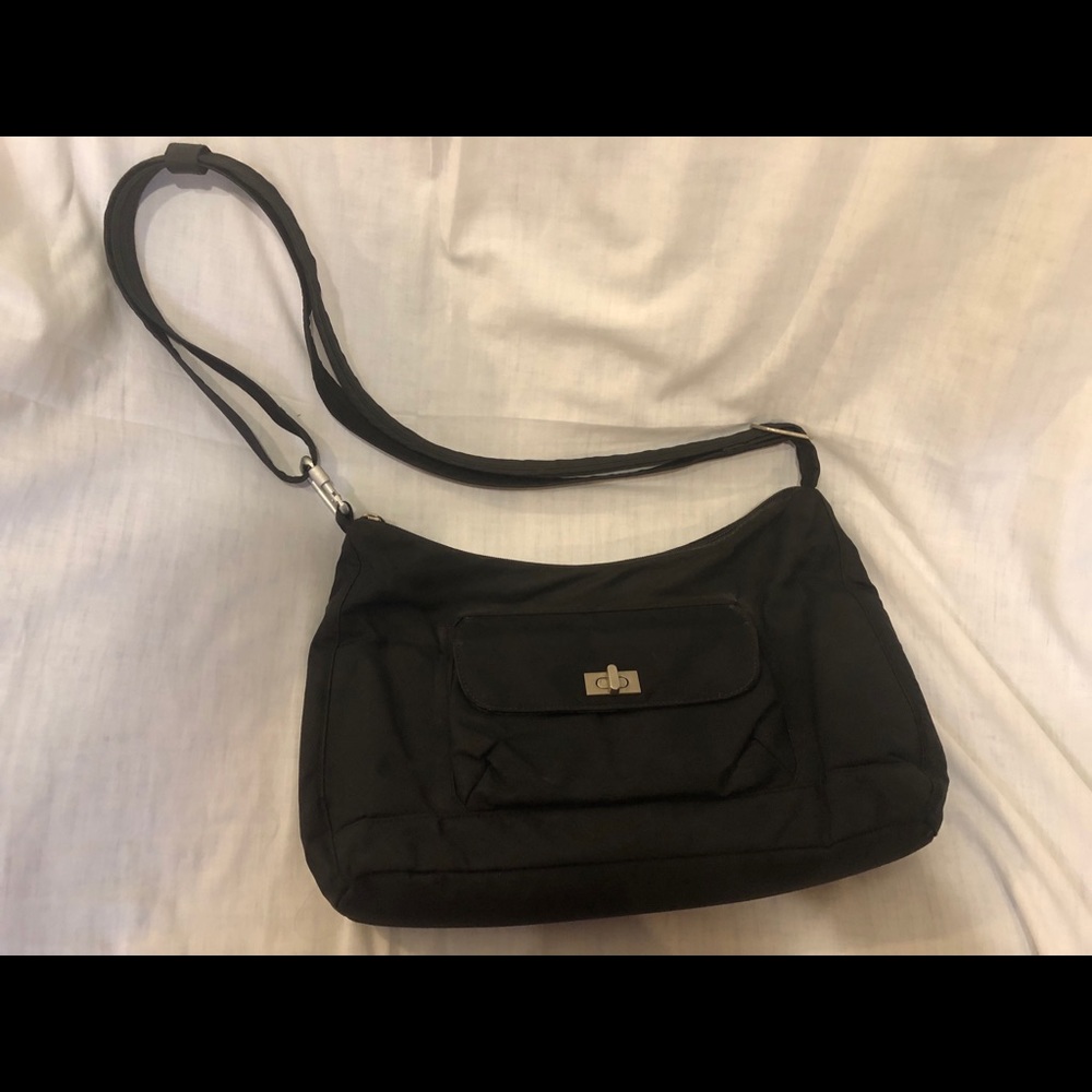 Magellan (TravelSmith) anti-theft crossbody bag.